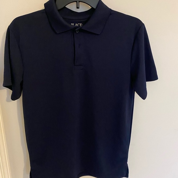 Boys navy blue uniform polo. 100% polyester. - Picture 3 of 4